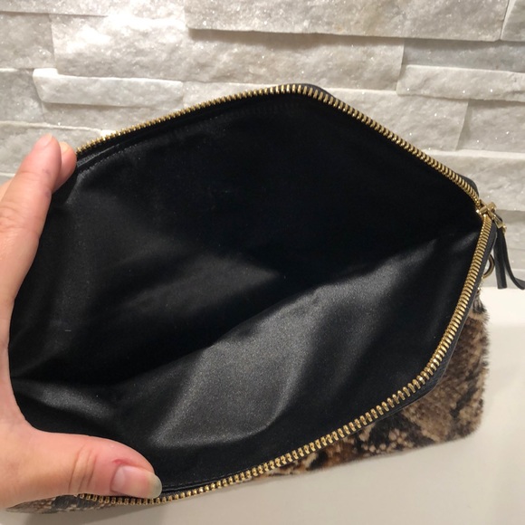 Henri Bendel ponyhair Deb slim in snake pattern